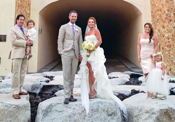 The happy couple with their groomsmen and bridesmaid 