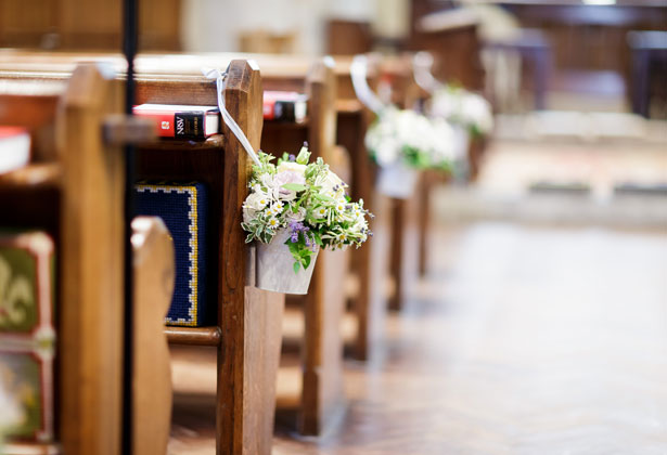 White, purple floral aisle decoration 