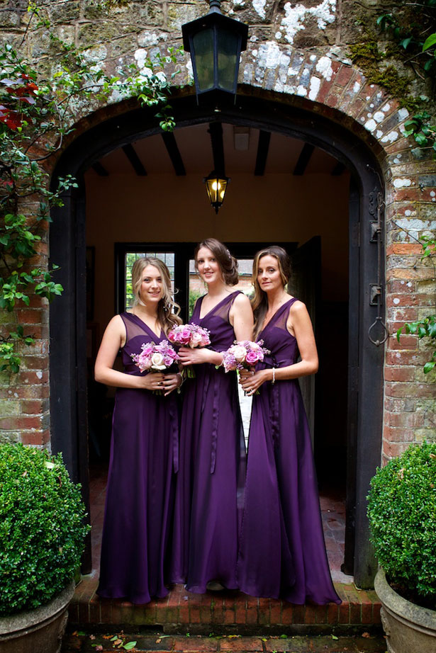 Bridesmaids in long purple gowns from Debenhams 