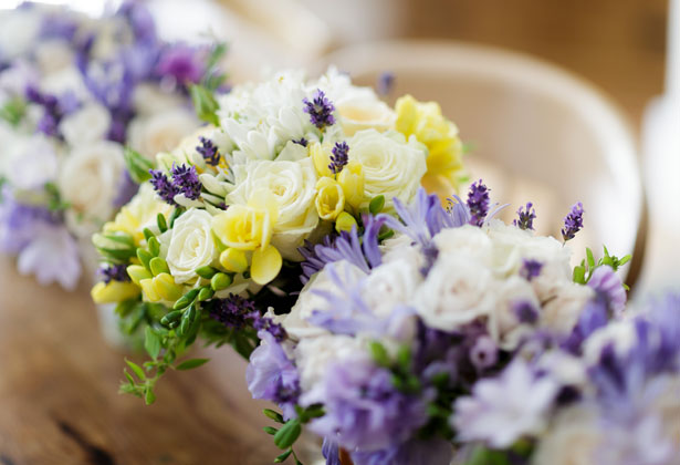 Purple, yellow and white wedding bouquets 