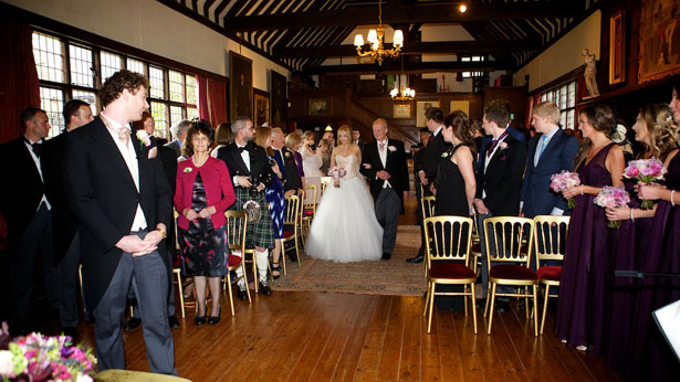 Bride walking down the aisle with her father 