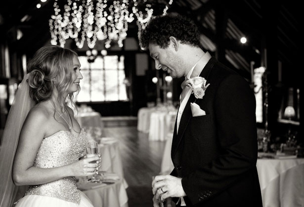 Newlyweds toasting their marriage