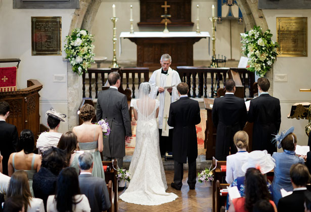 Bride and groom at the alter 