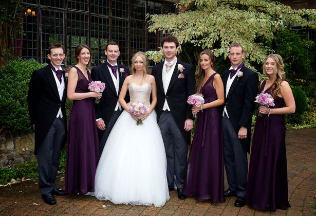 The newlyweds with the bridesmaids and groomsmen 