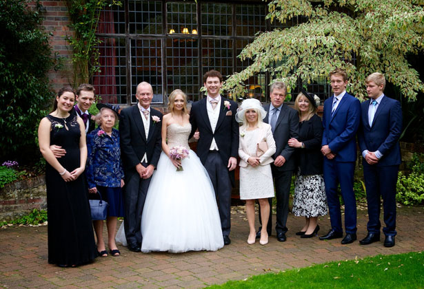 The newlyweds with their family 