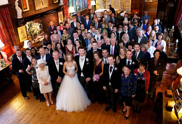 The newlyweds with their family and friends 