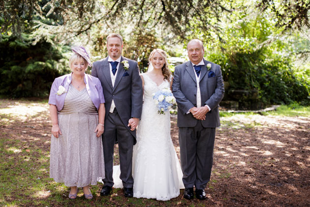 The newlyweds with their family by Douglas Fry