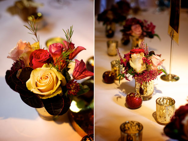 Rich Champagne and purple wedding flowers and table setting 