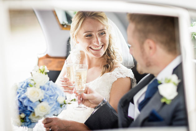 The bride and groom toasting their marriage 