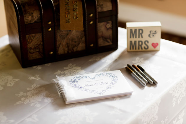 Travel chest and white guest book 