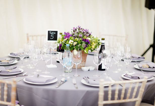 Purple, yellow and green potted centrepiece  