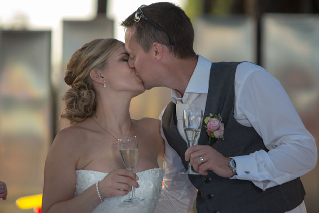 Newlyweds toasting their marriage