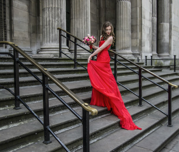 Bride in red wedding dress by Halo and Hobby