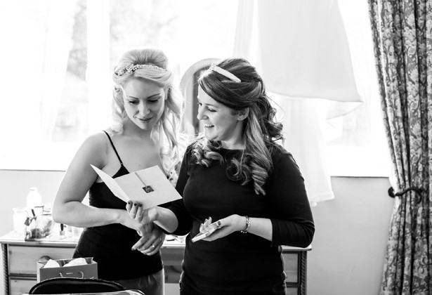 Joy in January - Sarah and Simon Ivory and Gold Real Wedding Bride with Bridesmaid Pre-ceremony 