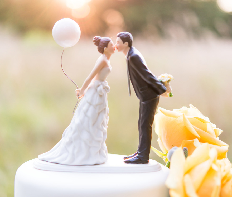 "Leaning In For A Kiss" Balloon Wedding Cake Topper - Wanderlust Cake Topper | Confetti.co.uk