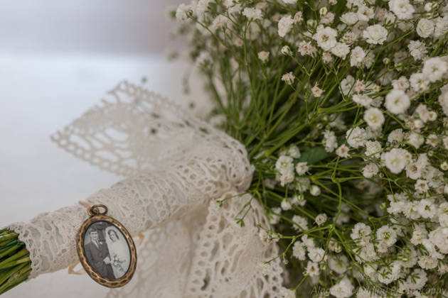 Baby breath wedding bouquet with lace handle and vintage brooch     