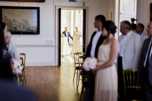 Guests standing for the brides arrival 