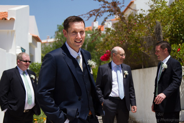 The groom with his best man and groomsman 