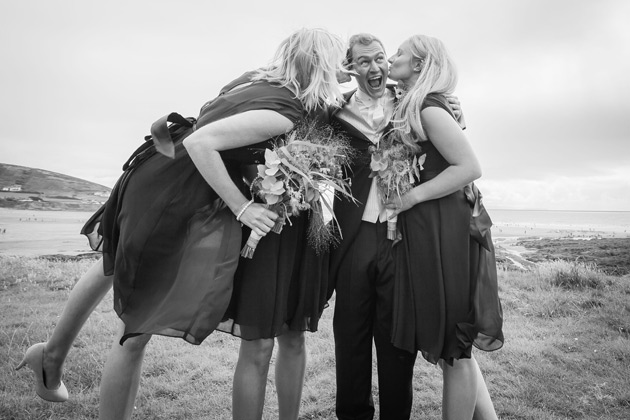 The groom with the bridesmaids 