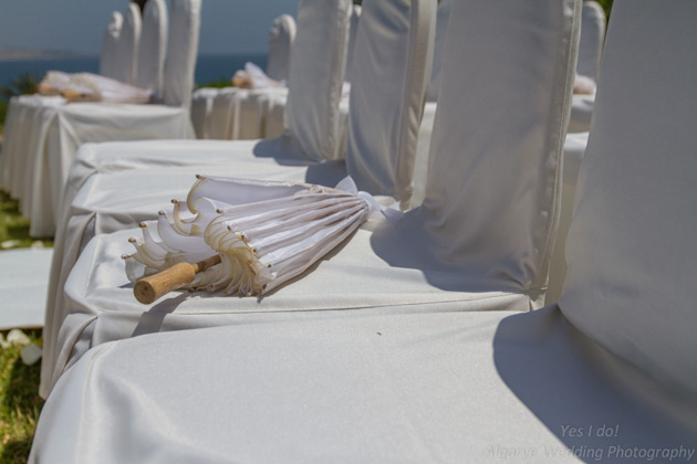 White parasol for the wedding guests   