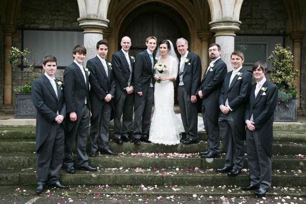 The newlyweds with the groomsmen