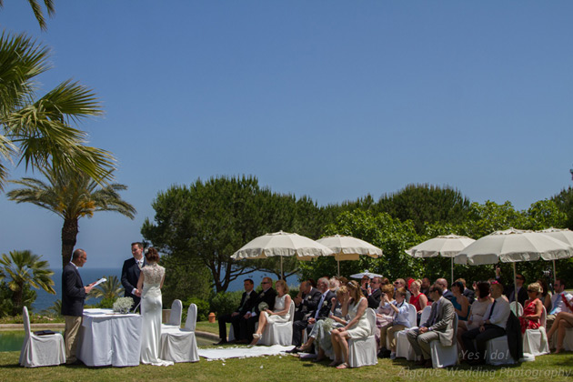 Guests watching the wedding ceremony       