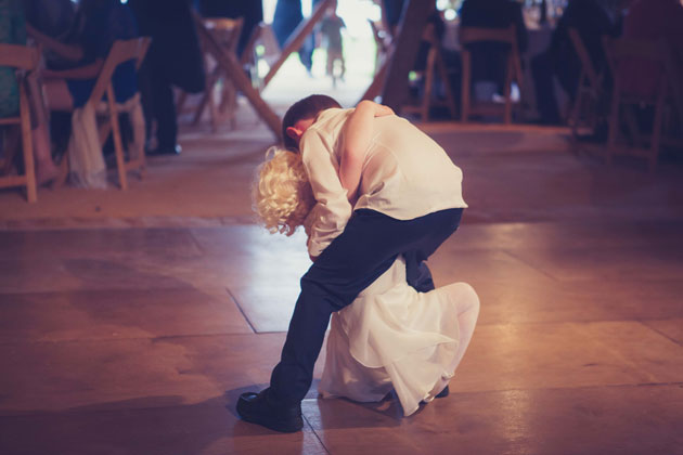 Younger wedding guests taking to the dance floor 