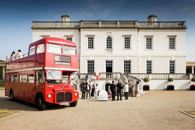 Open top red bus for the wedding guests   