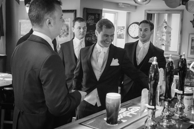 The groom with his groomsmen in the pub 