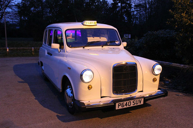 Camera Cabtastic photo booth in a London taxi cab