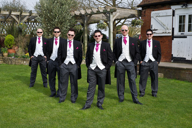 The groom with his best men in suits from Moss bros