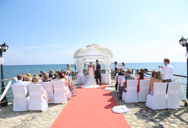 The guests watching the ceremony     