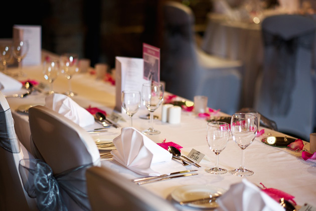 Fuchsia pink and silver wedding table 