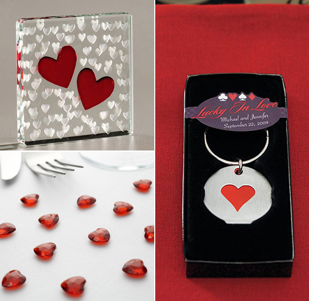 Red heart shaped wedding favours and confetti   