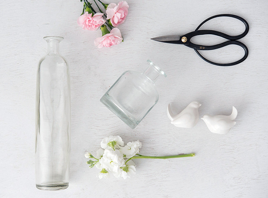 Glass Bottles and Flowers Wedding Decor Ideas | Confetti.co.uk