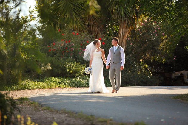 Bride and groom holding hands