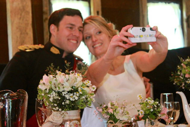 Newlyweds taking a selfie    