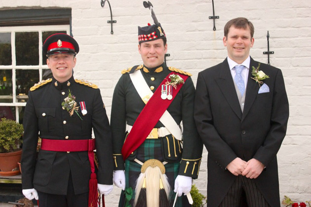 Groom and best man in military uniform