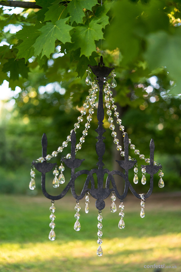 Metal black chandelier with crystals    