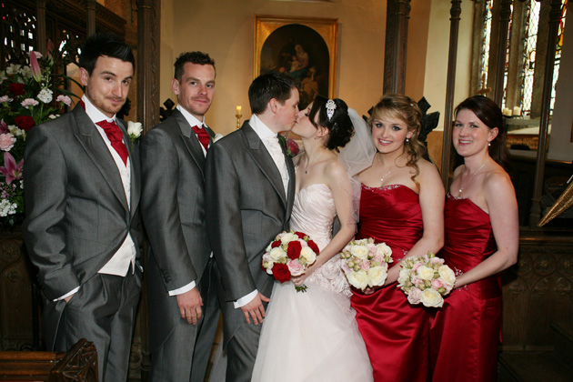 The bride and groom with their bridesmaids and groomsmen | Confetti.co.uk