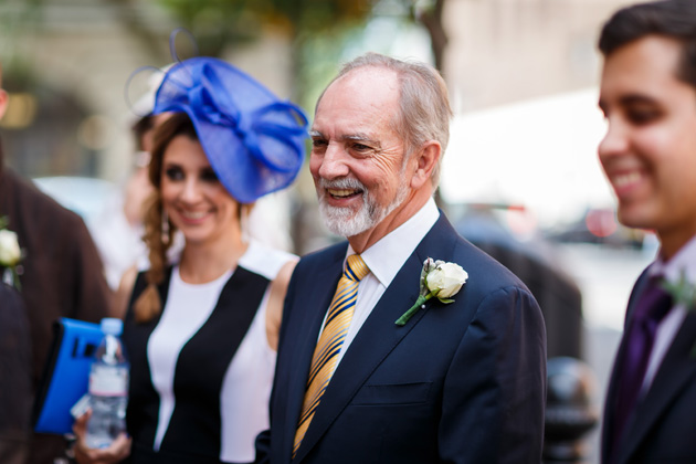 Bride’s father waiting for her at the ceremony in a blue suit  | Confetti.co.uk