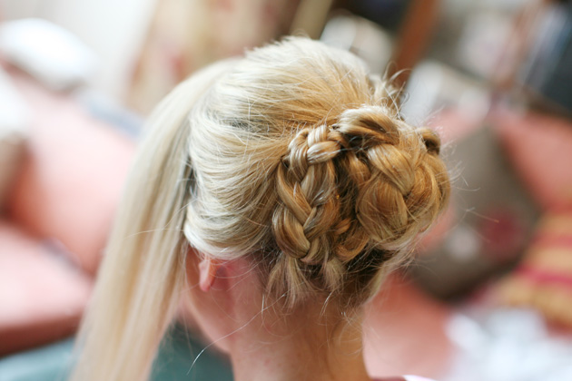 Wedding hairstyle idea: braided bridal bun| Confetti.co.uk