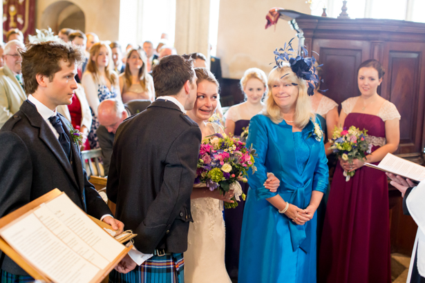 The groom kissing the bride | Confetti.co.uk