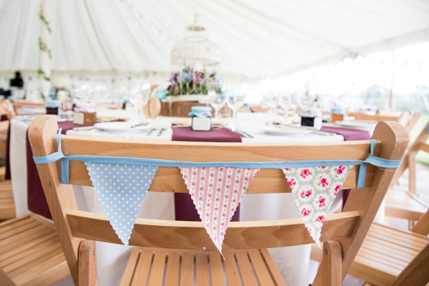 Rustic vintage bunting on chairs | Confetti.co.uk