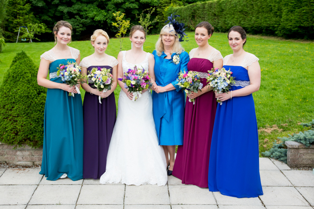 Bride with her bridesmaids in their Alfred Angelo dresses | Confetti.co.uk