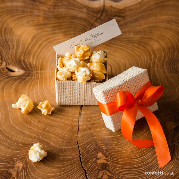 Package a handful of gourmet popcorn in a pretty jewllery box for an instant foodie favour from Confetti.co.uk