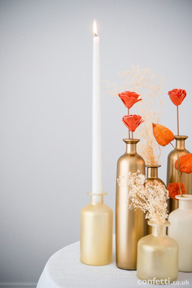 Tapers, faux flowers and painted glass bottles | Confetti.co.uk