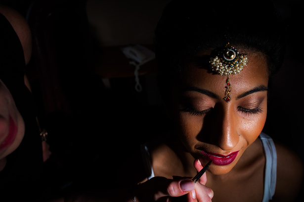 Bridal hair and make by Camilla Collins | Traditional Indian bride hair and makeup with tikkah | Confetti.co.uk