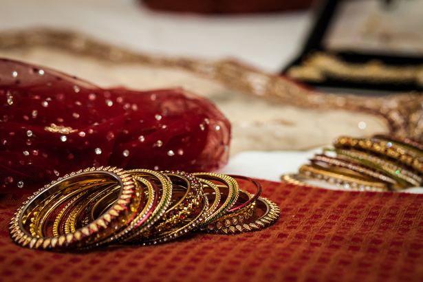 Indian red and gold bridal bangles | Confetti.co.uk