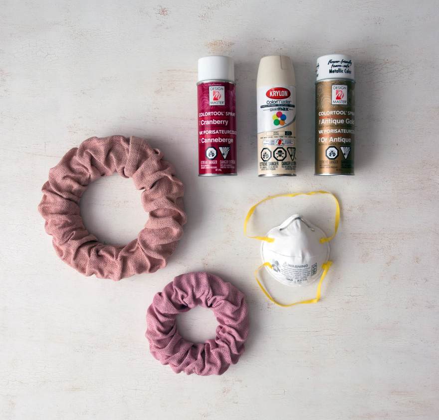 DIY Wreath Decor - Vintage pink burlap wreaths, mask, and colourful spray paint DIY supplies | Confetti.co.uk